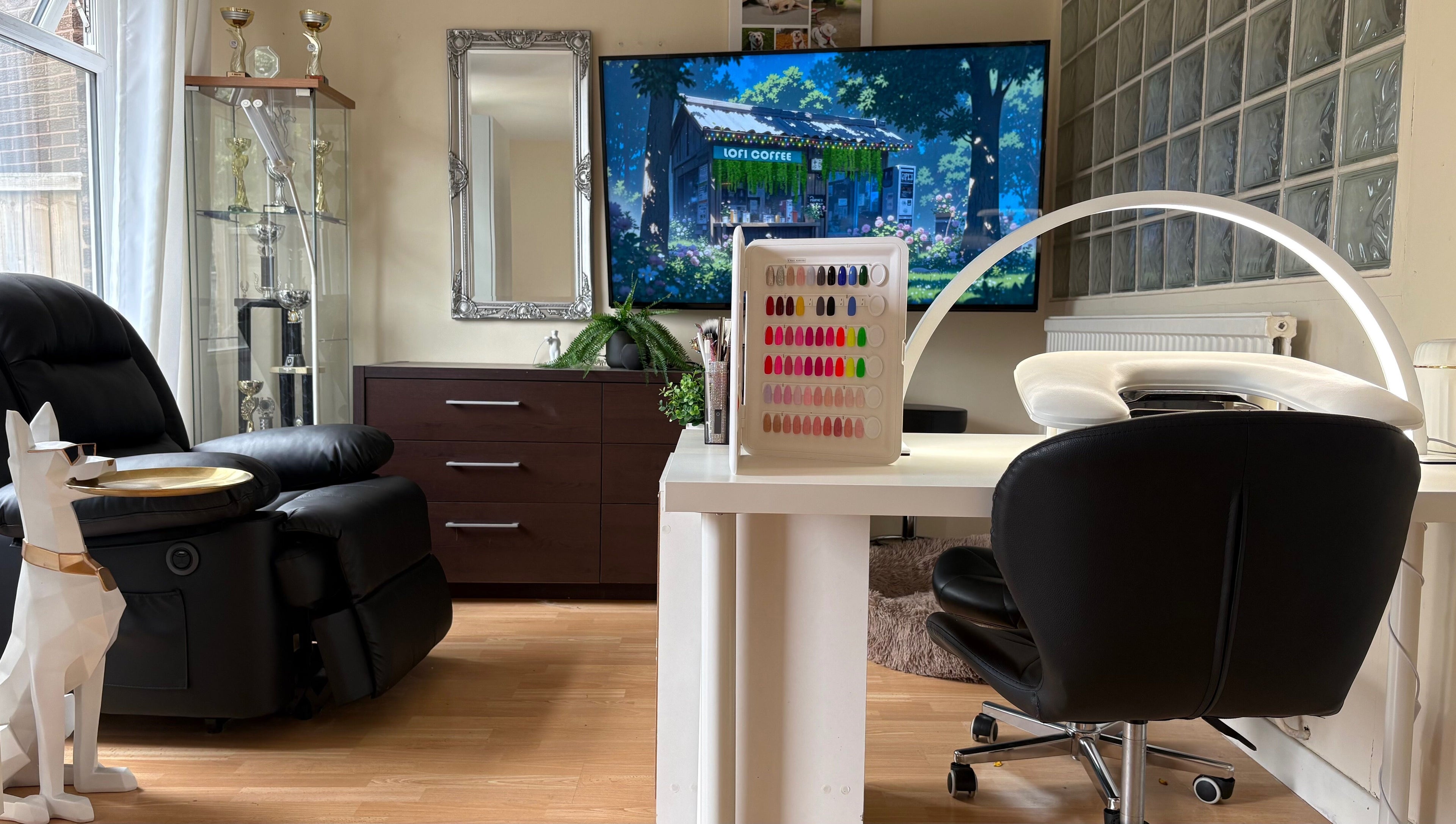 Modern nail studio at Nails By Sonya Stark, Leeds, England, GB, featuring sleek furniture and vibrant nail colors.