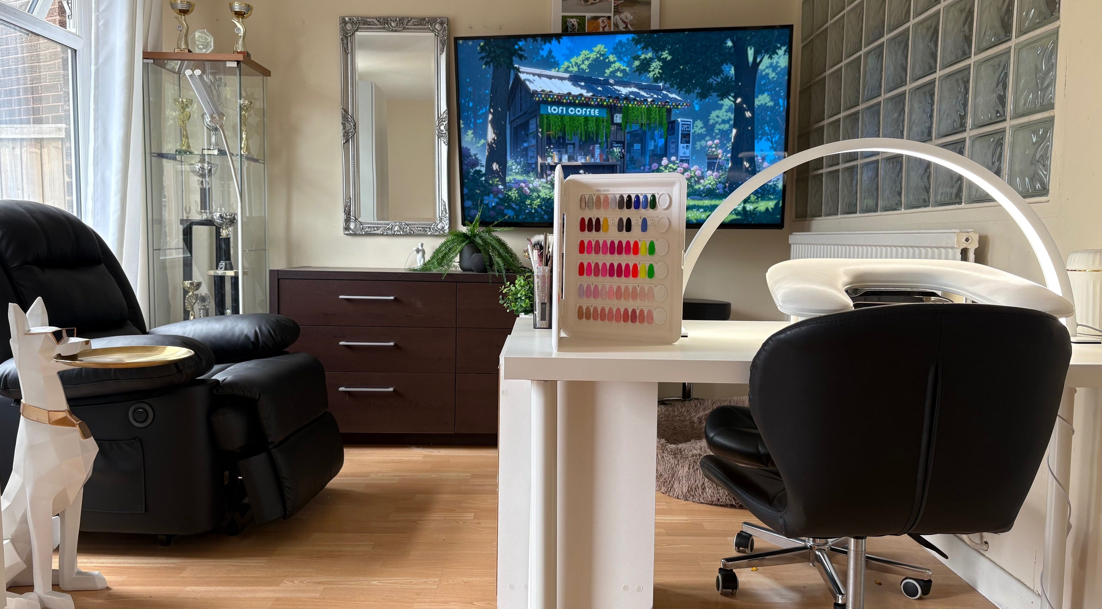 Modern nail studio at Nails By Sonya Stark, Leeds, England, GB, featuring sleek furniture and vibrant nail colors.