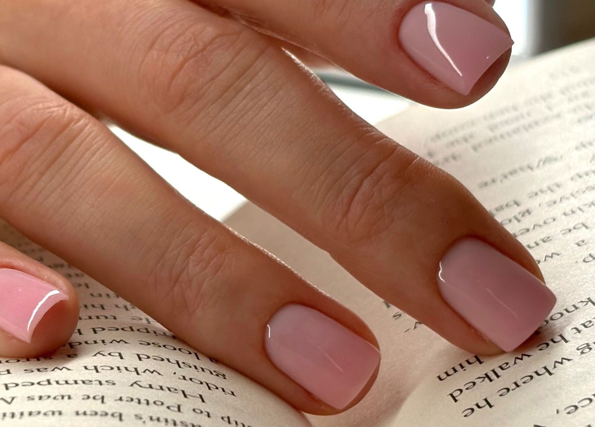 Elegant pink manicured nails at Nails By Sonya Stark, Leeds, England, GB showcasing glossy finish.