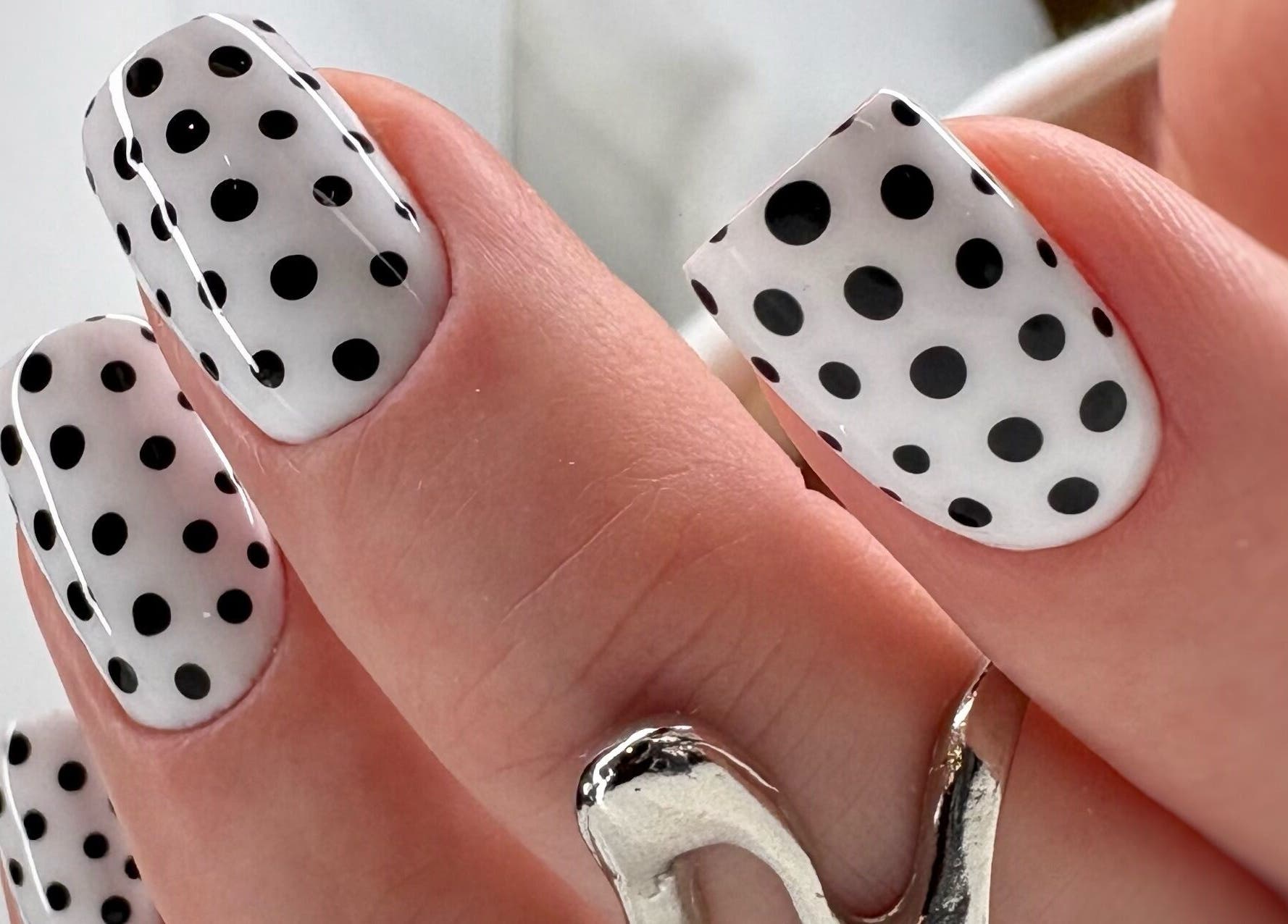 Polka-dot black gel manicure at Nails By Sonya Stark, Leeds, England, GB.