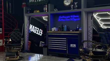 Stylish interior of Elegance Studio Barbers in Paphos, CY featuring luxury barber chairs and modern decor.