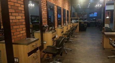 Modern salon interior at Salon Mirage, Hamilton, Ontario, CA with sleek styling stations and elegant lighting.