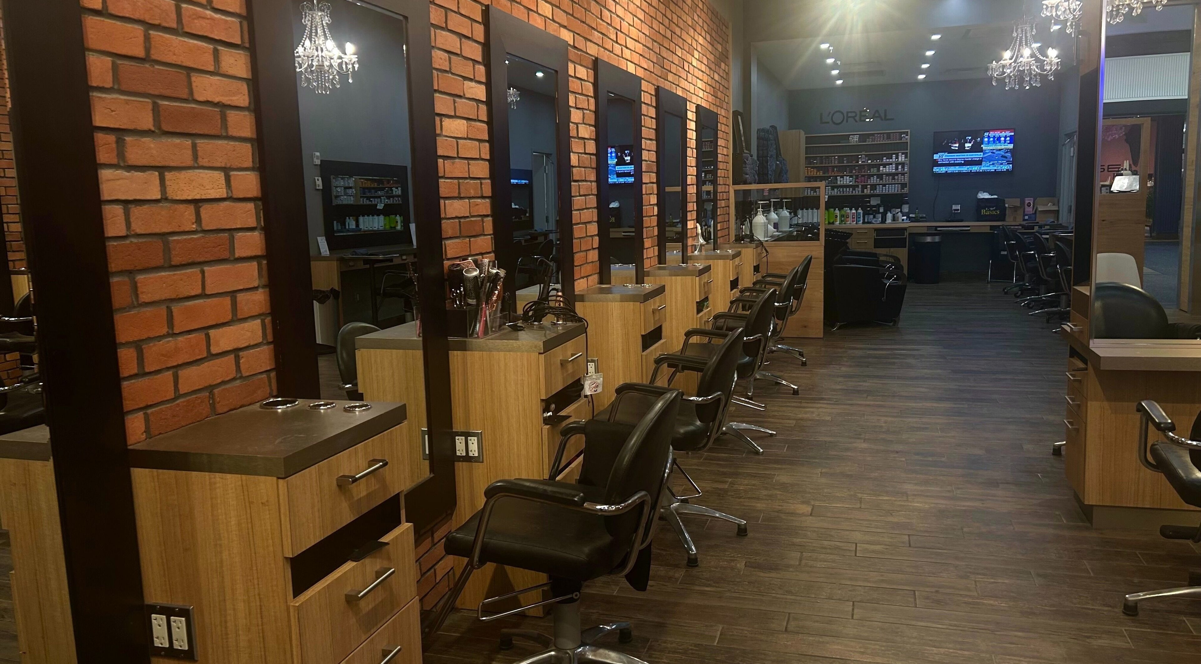 Chic salon interior at Salon Mirage, Hamilton, Ontario, CA features modern styling stations and sleek design.