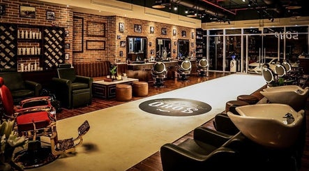 Chic interior of Soho Vintage Barbers on Sheikh Zayed Road, Dubai, Dubai, AE, featuring stylish chairs and decor.