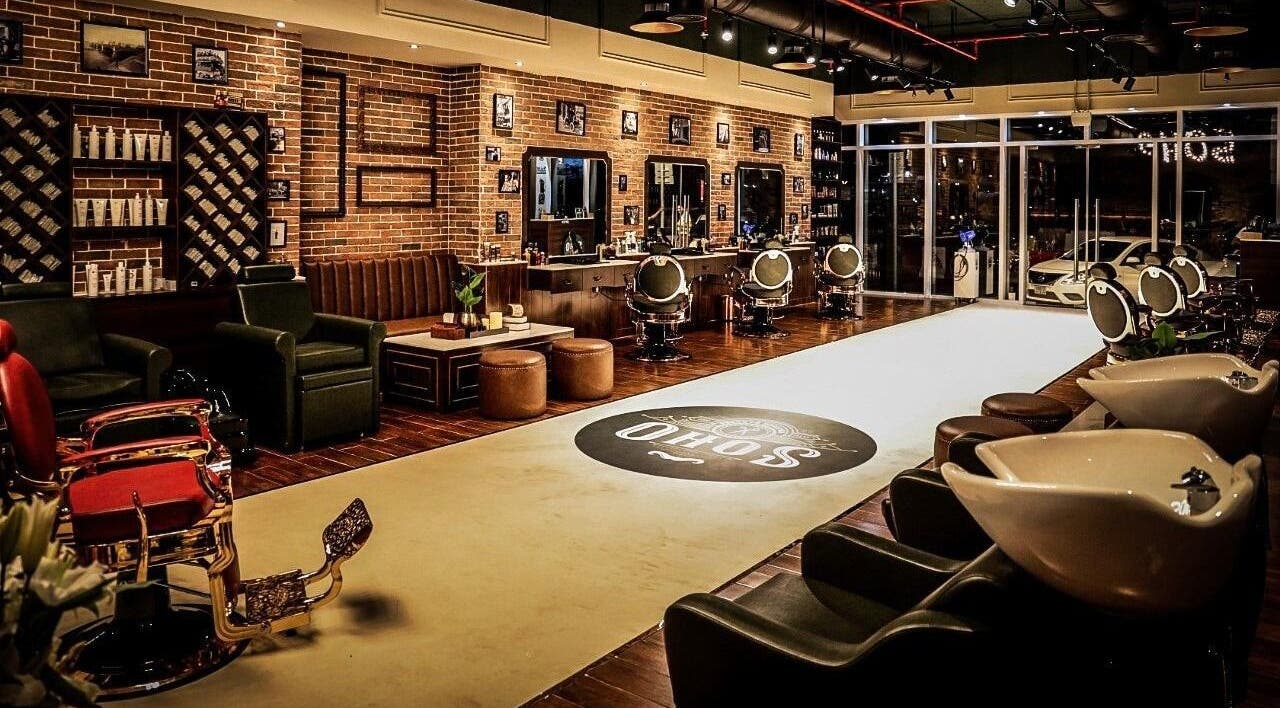 Chic interior of Soho Vintage Barbers on Sheikh Zayed Road, Dubai, Dubai, AE, featuring stylish chairs and decor.