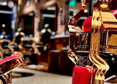 Vintage barber chair in red and gold at Soho Vintage Barbers | Sheikh Zayed Road, Dubai, Dubai, AE.