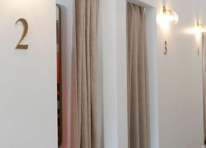 Elegant treatment rooms with soft lighting at Zadig Studio - Newcastle, New South Wales, AU.