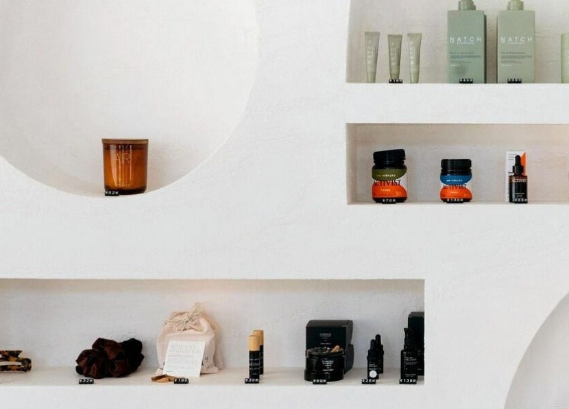 Stylish beauty product display on white shelves at Zadig Studio - Newcastle, Newcastle, New South Wales, AU.