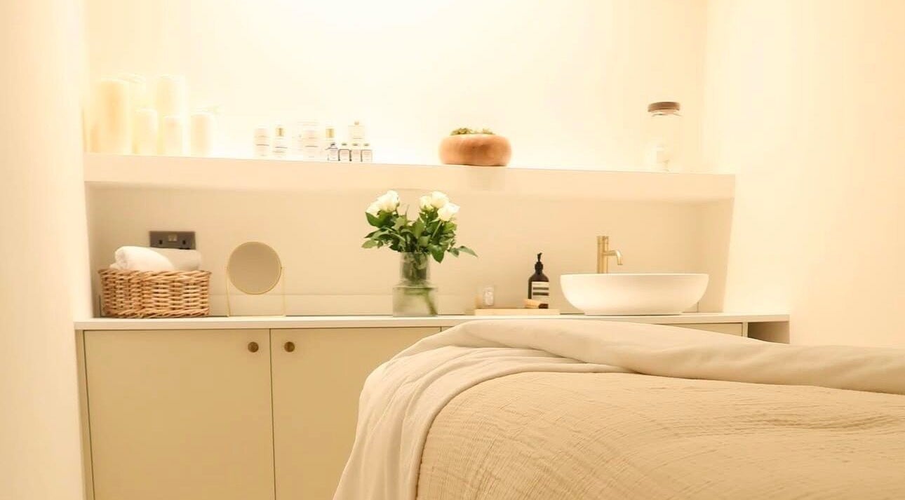 Serene treatment room at WESTERHAM, Kent, England, GB, featuring cozy linens and elegant decor.