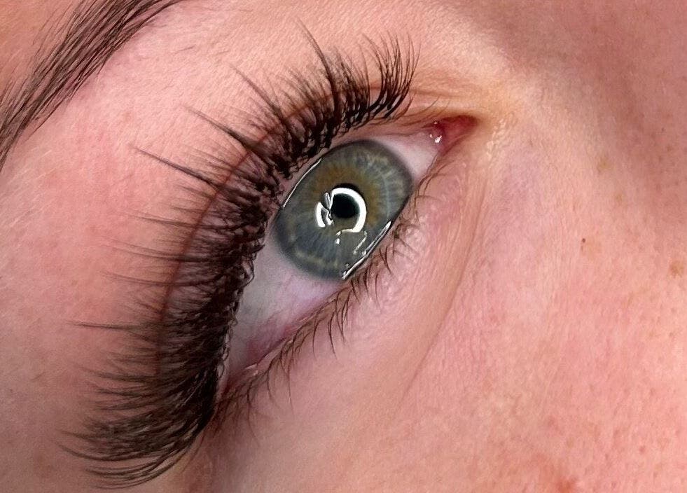 Close-up of enhanced eyelashes at Blink & Sculpt, Brixworth, England, GB, showcasing lash extension artistry.