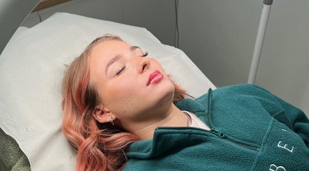 Client enjoying a facial treatment at Skin South Wales in Trethomas, Wales, GB for a rejuvenating experience.