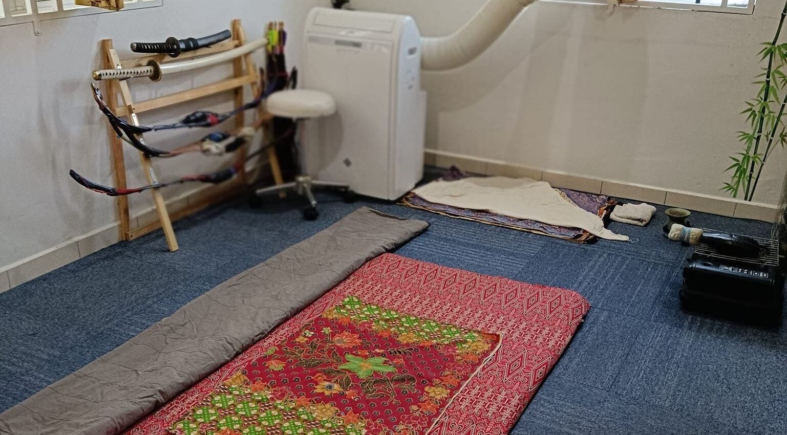 Cozy wellness room at Tusuk Jari Pulau Pinang, Bukit Mertajam, Pulau Pinang, MY with mats and bamboo decor.