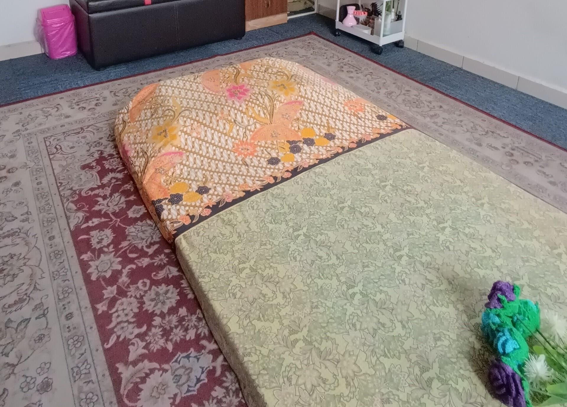 Cozy massage setup at Tusuk Jari Pulau Pinang, Bukit Mertajam, Pulau Pinang, MY with patterned mats and cushions.