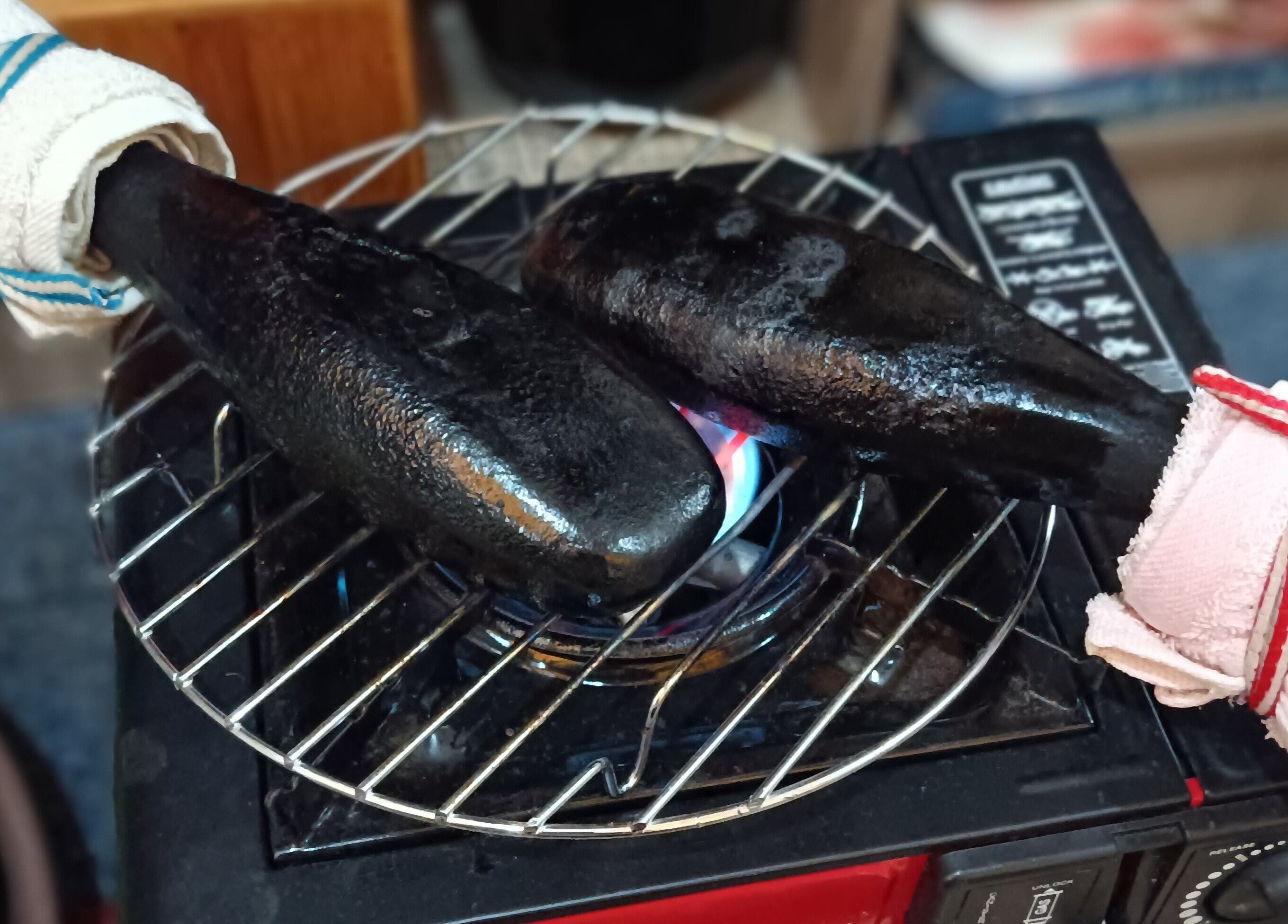 Heated stones in ritual at Tusuk Jari Pulau Pinang, Bukit Mertajam, Pulau Pinang, MY