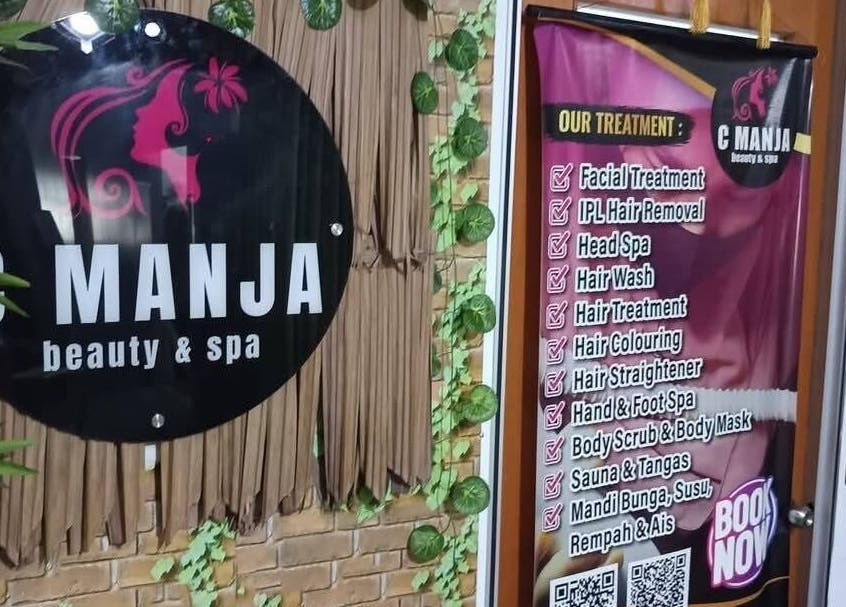 C Manja Beauty & Spa entrance showcasing services list in Kuantan, Pahang, MY.
