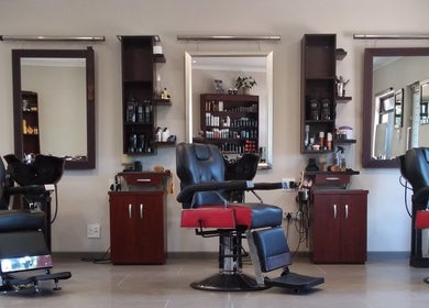 Elegant salon chairs and mirrors at XCO MAN, Cape Town, Western Cape, ZA.