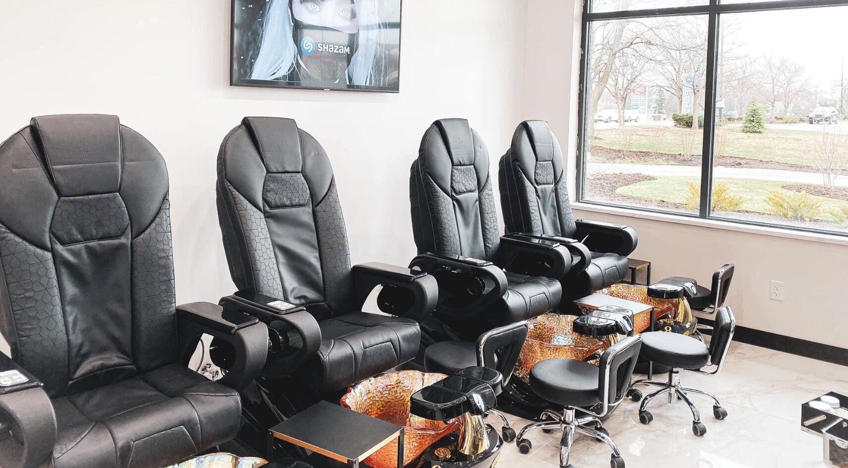 Luxurious pedicure chairs at Ava Nail Bar Geneva, providing comfort and style in Geneva, Illinois, US.