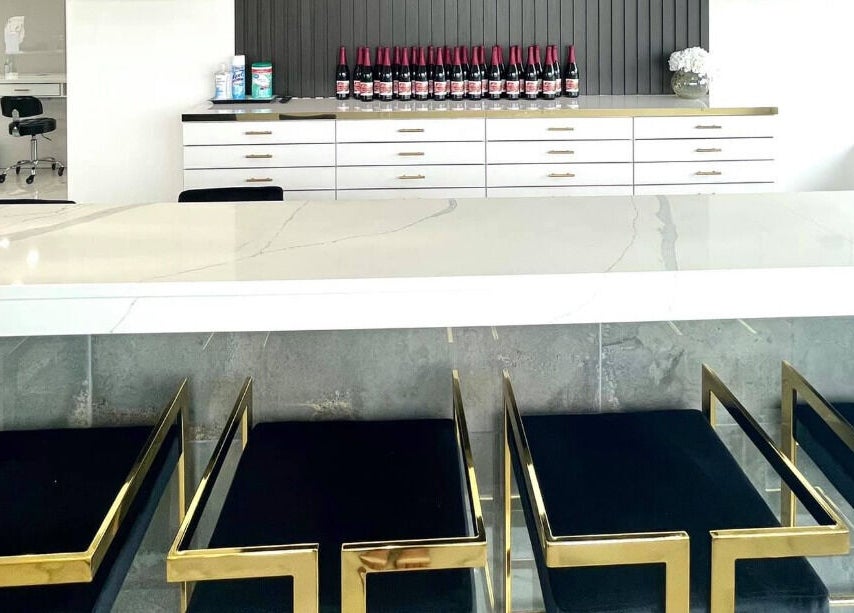 Elegant seating and counter at Ava Nail Bar Geneva, Geneva, Illinois, US showcasing modern decor.