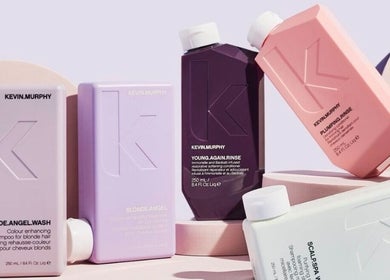 Kevin Murphy hair products on display at Escape Hair, Strensall, England, GB, showcasing vibrant shampoo bottles.