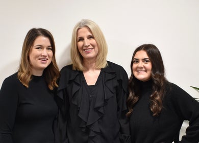 Escape Hair team smiling at Strensall, England, GB.