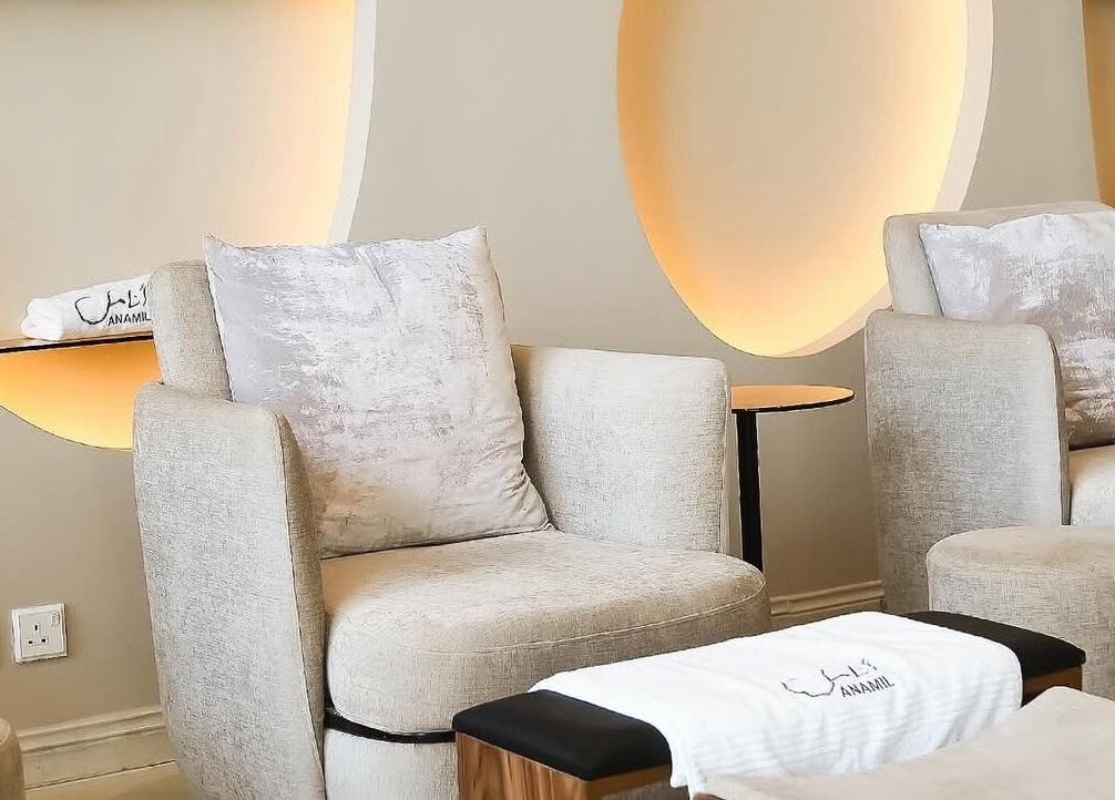 Luxury seating area at Anamil Spa - Qurtubah, Riyadh, Riyadh Province, SA, with plush chairs and ambient lighting.