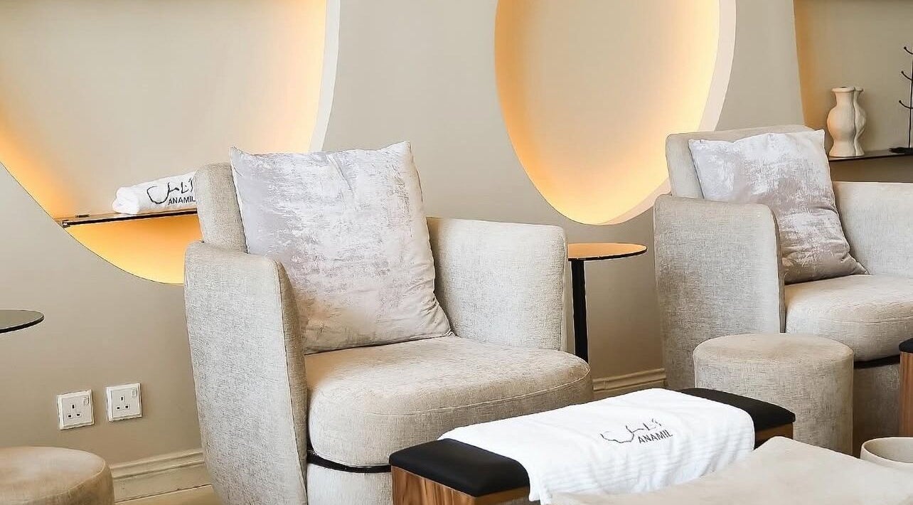 Luxury seating area at Anamil Spa - Qurtubah, Riyadh, Riyadh Province, SA, with plush chairs and ambient lighting.