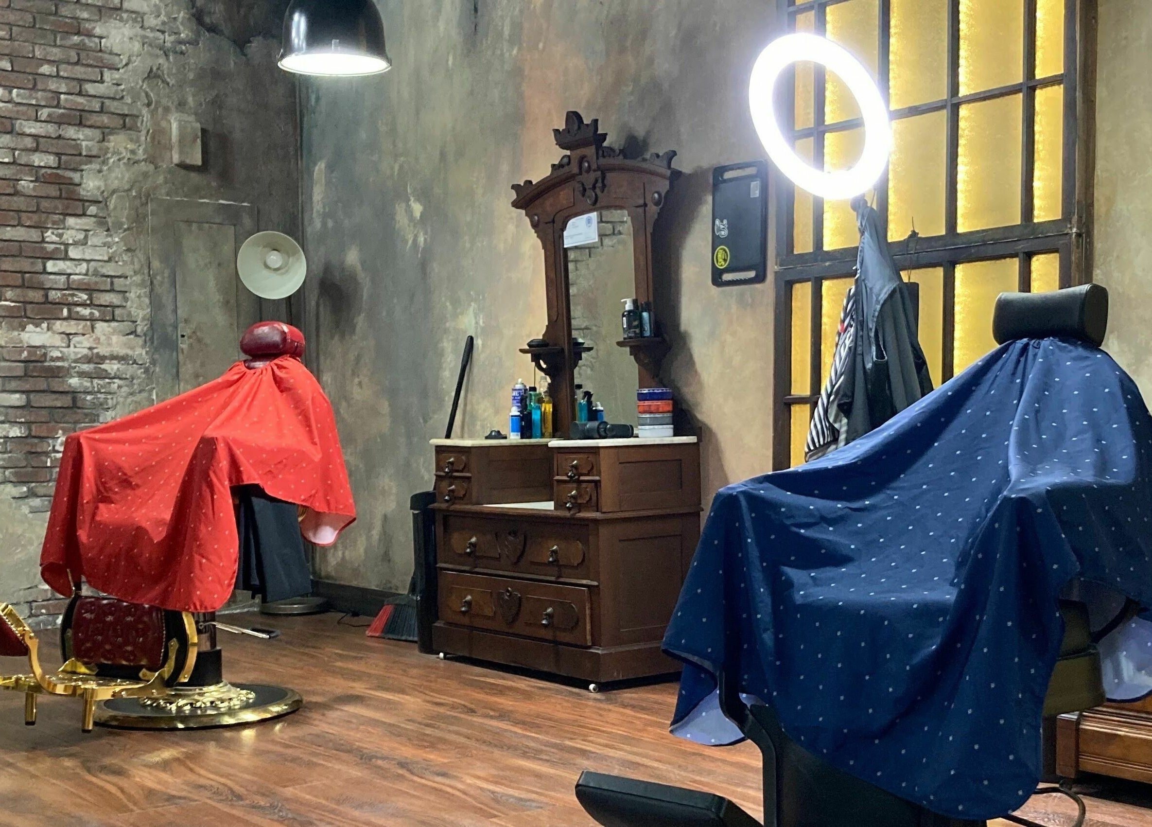 Vintage barber chairs and rustic decor at Vosco’s Barbershop, Logan, Utah, US, showcasing a classic style.
