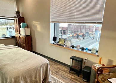 Cozy massage room at Body Alchemy Massage LLC in Fond Du Lac, Wisconsin, US with a street view.