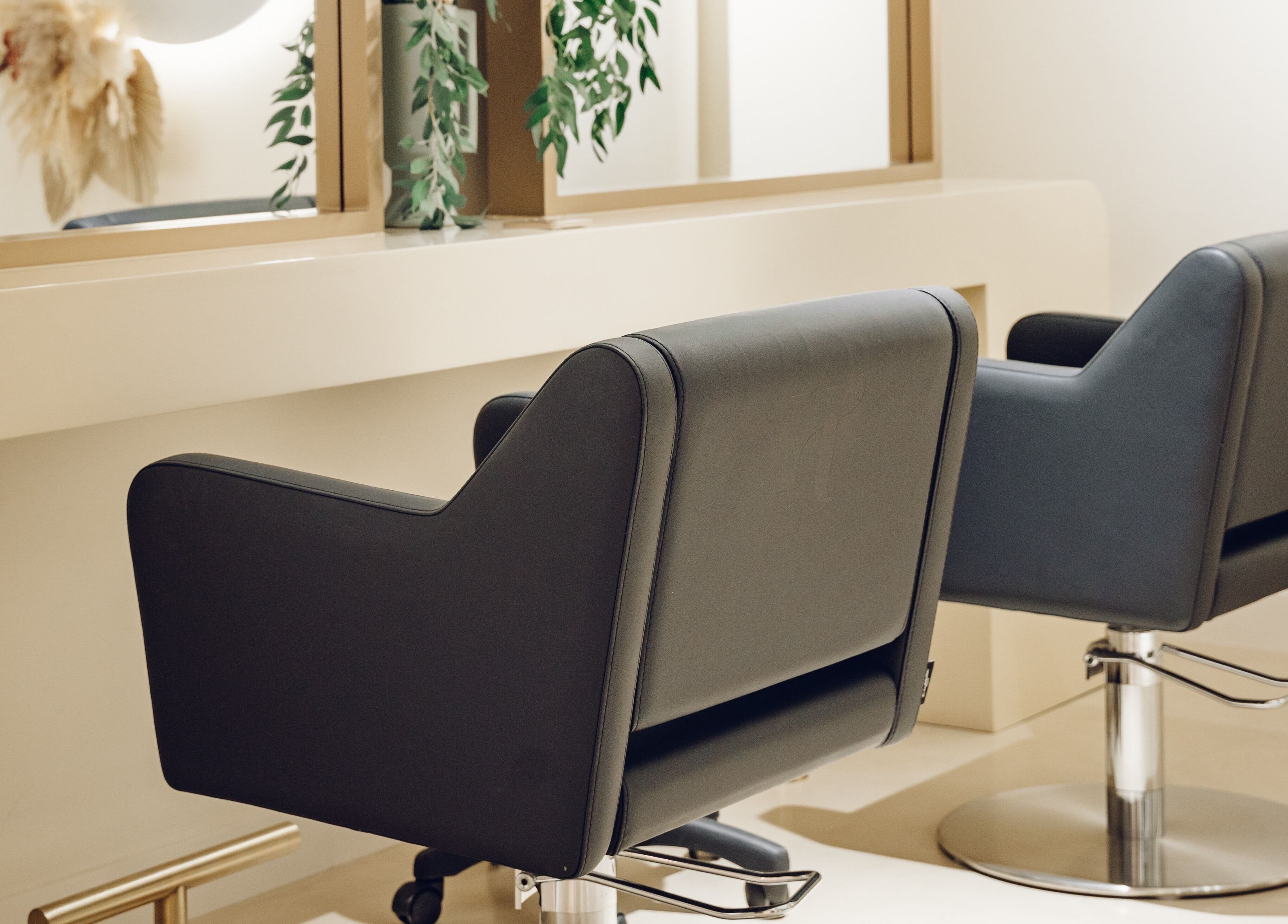 Modern salon chairs at The Hideaway in Dubai, AE, enhancing beauty and comfort.