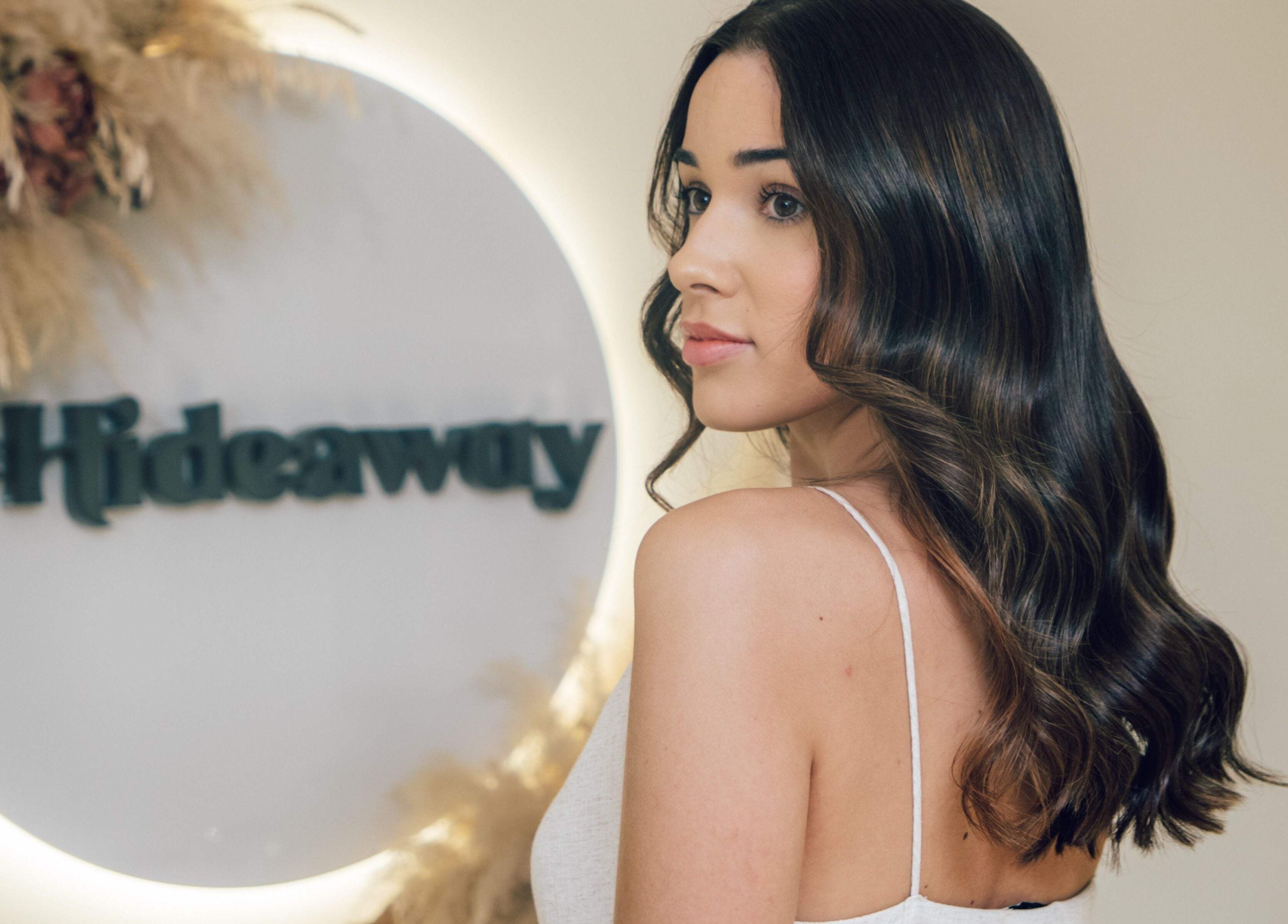 Woman with styled hair at The Hideaway, Dubai, AE.