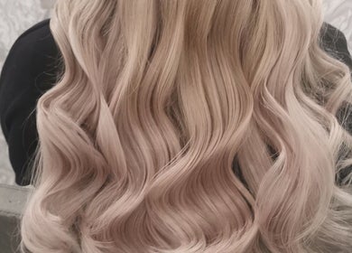Blonde hair in soft waves at Platinum Salon Rothwell - Lengths by Nathalie, Rothwell, England, GB.