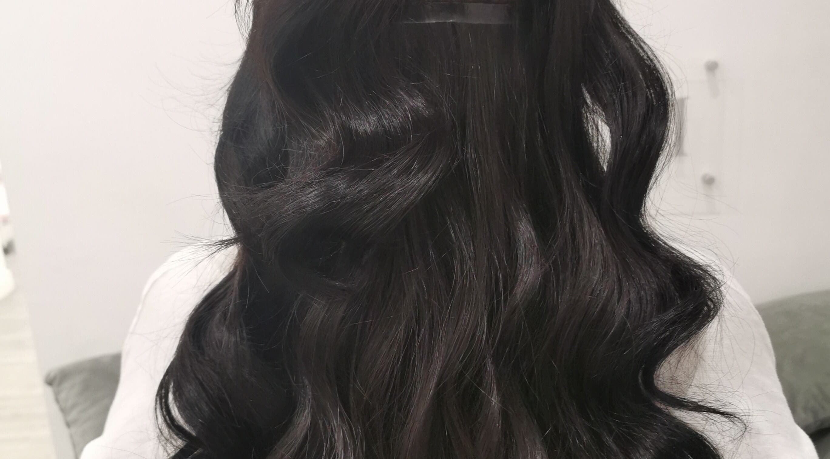 Luxurious black waves styled at Platinum Salon Rothwell - Lengths by Nathalie, located in Rothwell, England, GB.