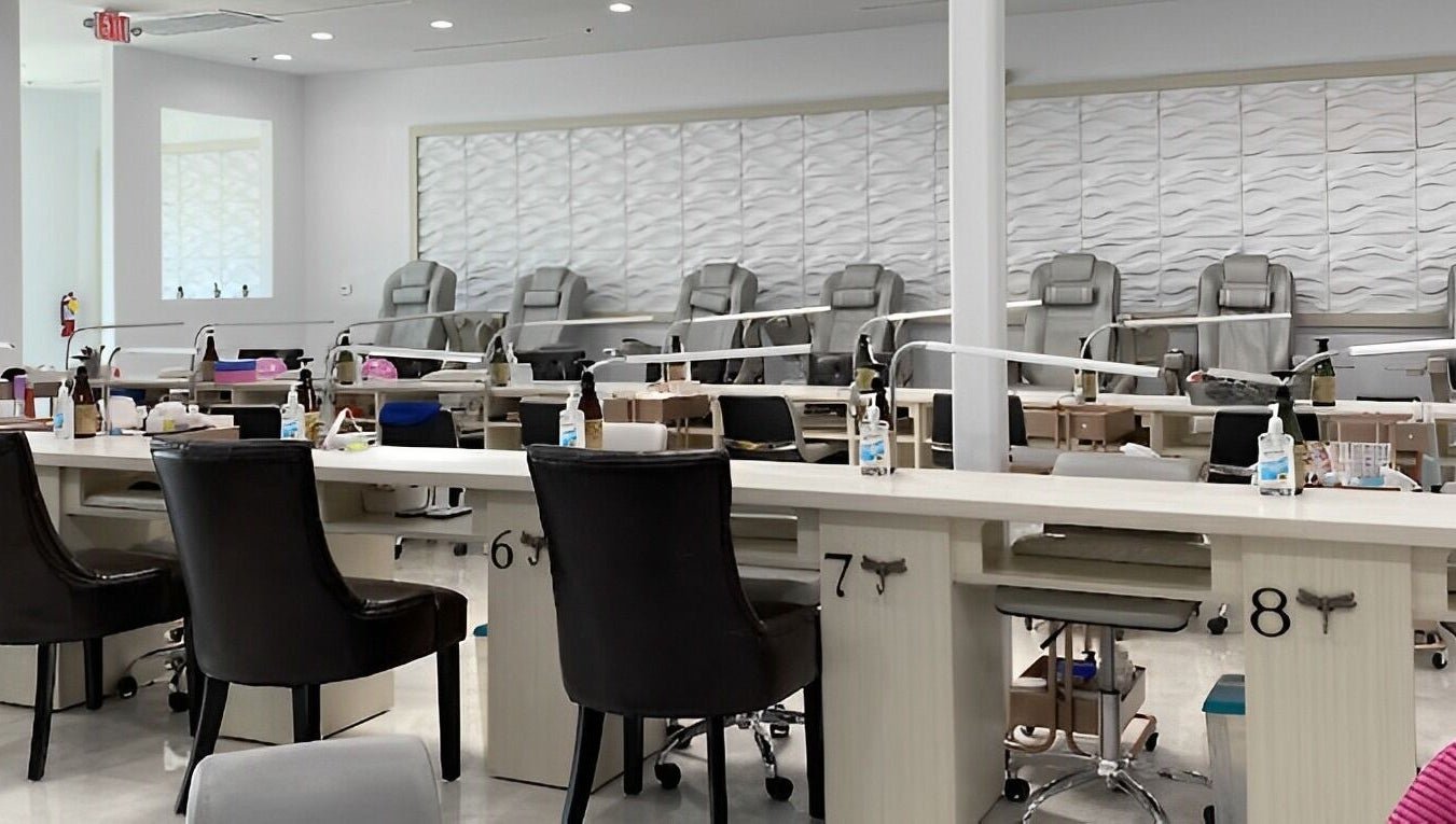 Spacious Skye Nail Lounge interior in Las Vegas, Nevada, US, featuring plush pedicure stations and modern decor.