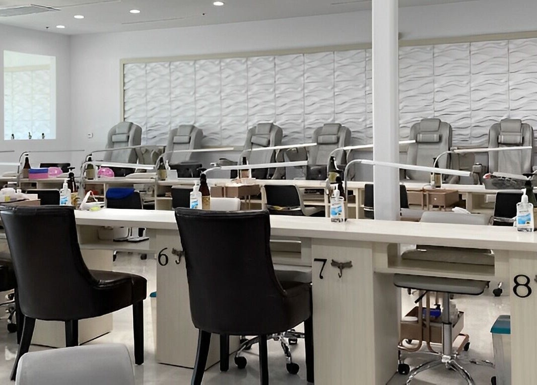 Spacious Skye Nail Lounge interior in Las Vegas, Nevada, US, featuring plush pedicure stations and modern decor.