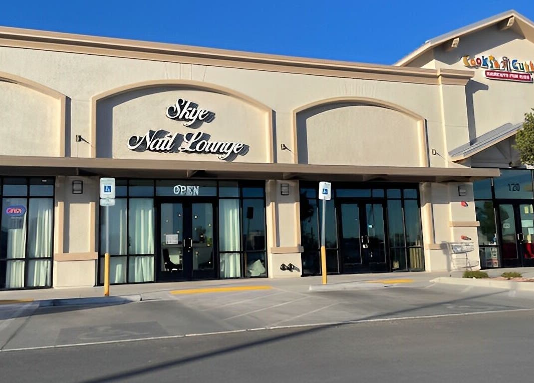 Entrance of Skye Nail Lounge in Las Vegas, Nevada, US, showcasing modern storefront design.