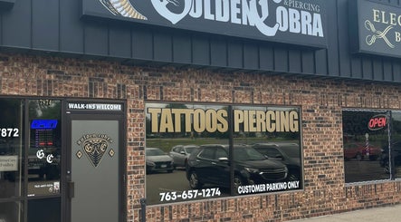 Golden Cobra Tattoo and Piercing