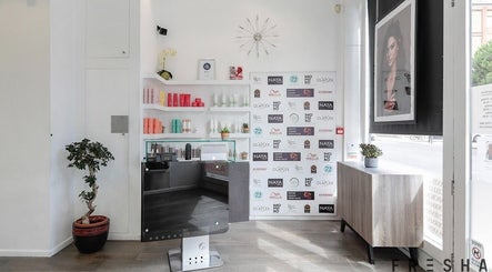 Reception area of Naya Hair & Beauty featuring modern decor and products in London, England, GB.