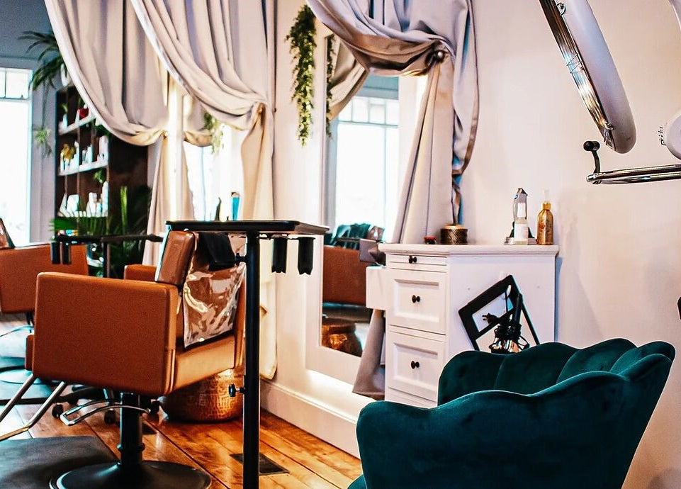 Cozy interior of Mountain Miracles Med Spa in Rangeley, Maine, US with modern decor and plush seating.