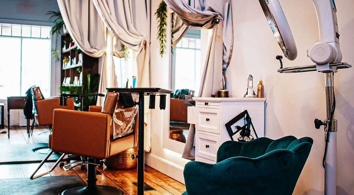 Cozy interior of Mountain Miracles Med Spa in Rangeley, Maine, US with modern decor and plush seating.