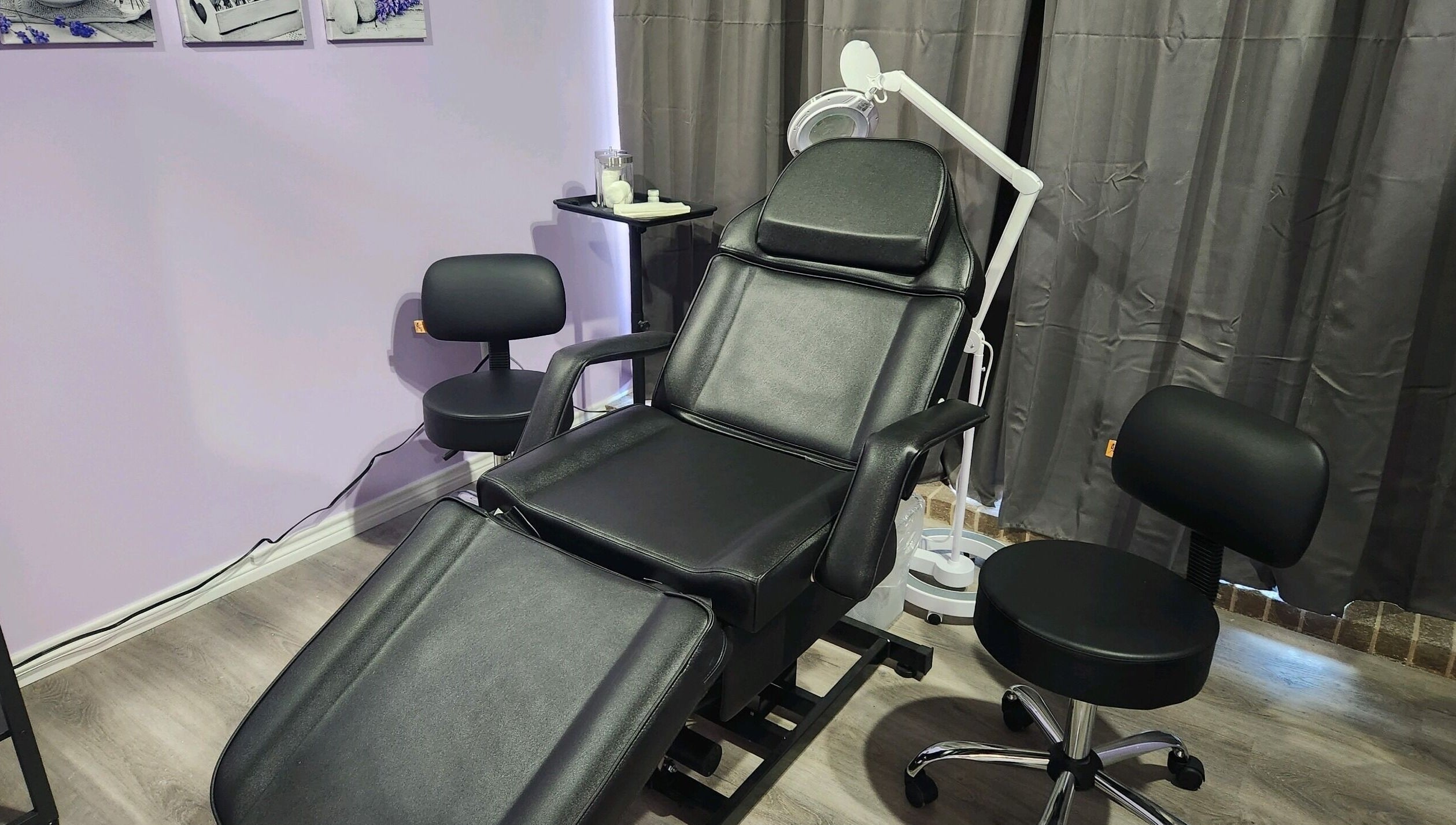 Comfortable black spa chair at New You MedSPA Southwest, Houston, Texas, US, perfect for treatments.