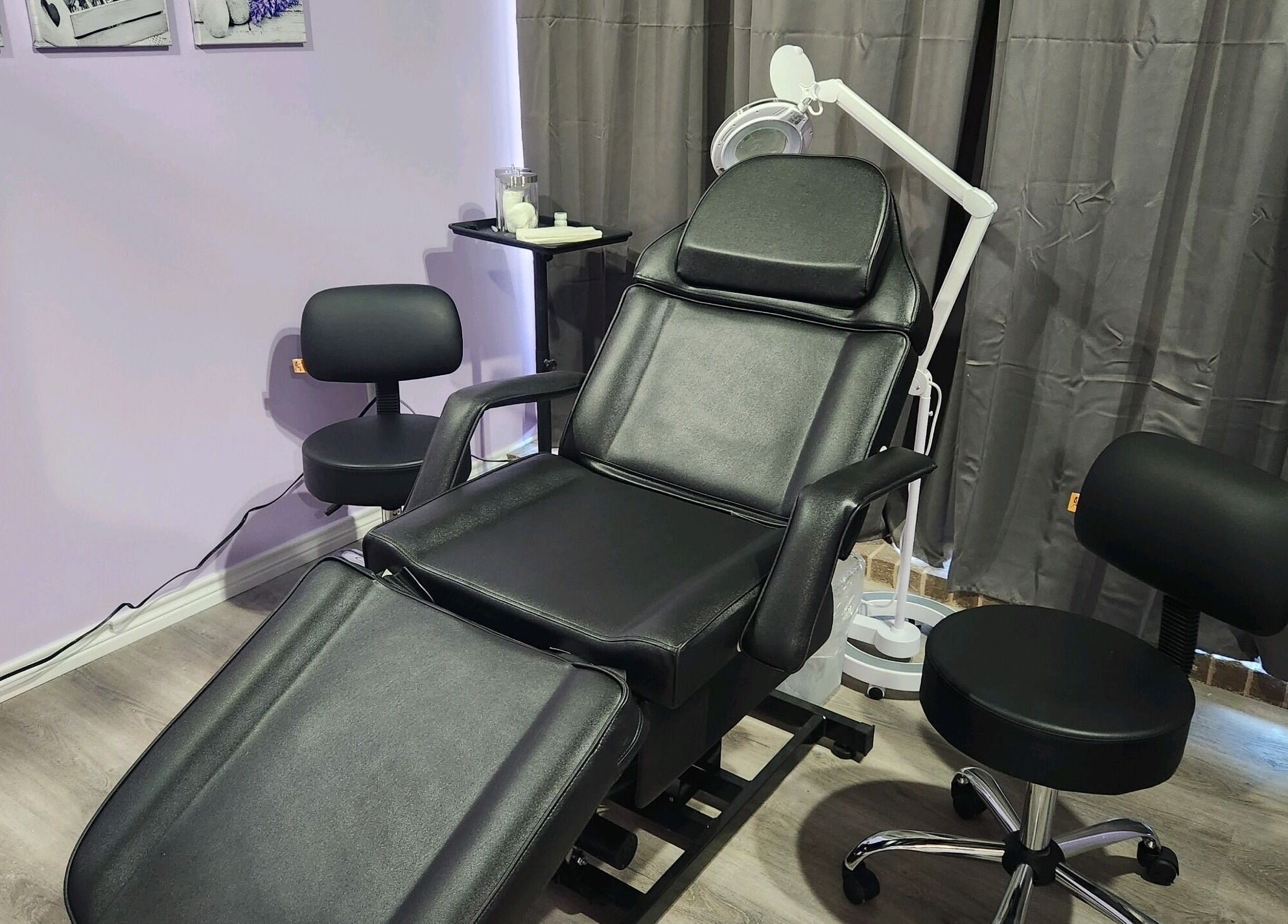 Comfortable black spa chair at New You MedSPA Southwest, Houston, Texas, US, perfect for treatments.