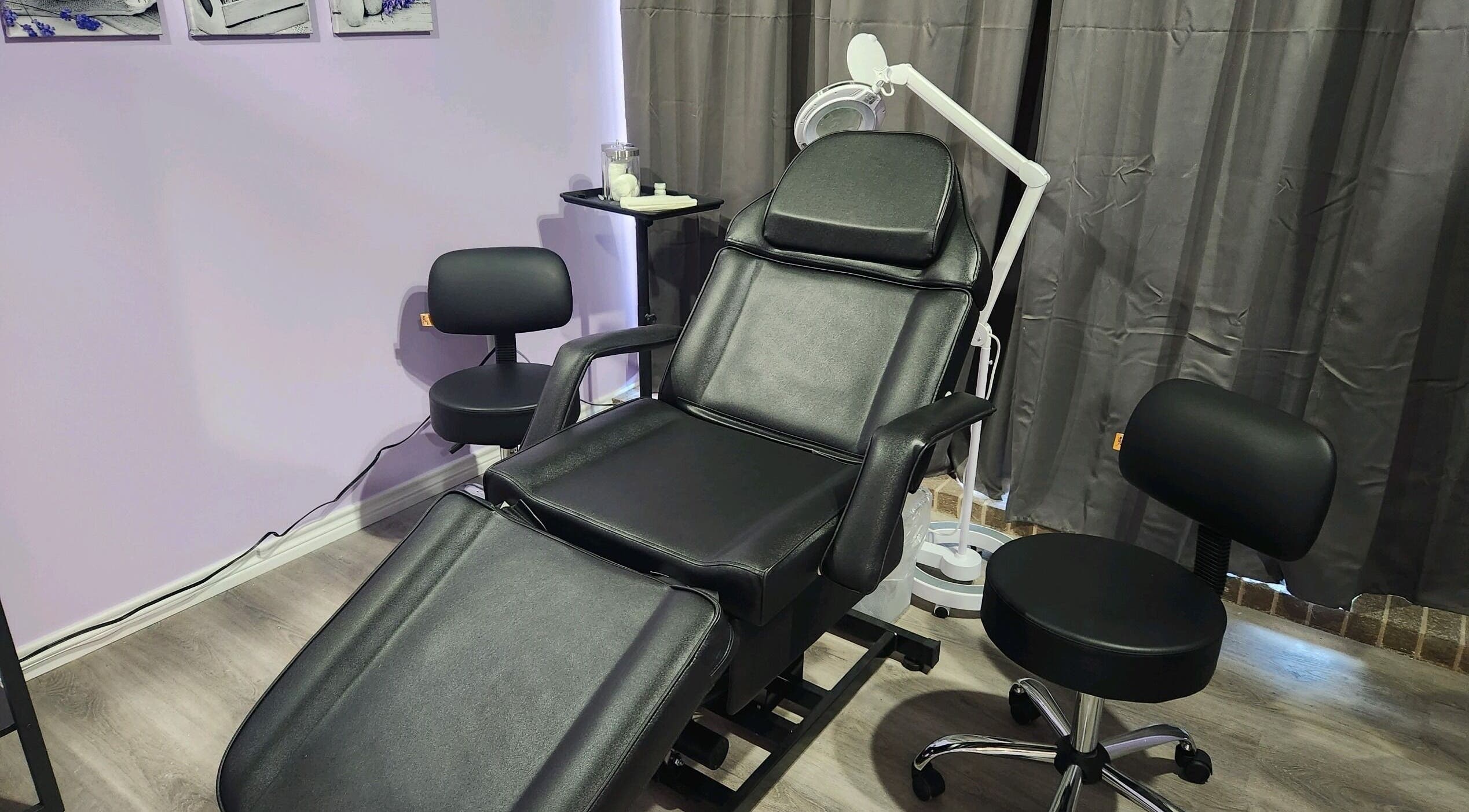 Comfortable black spa chair at New You MedSPA Southwest, Houston, Texas, US, perfect for treatments.