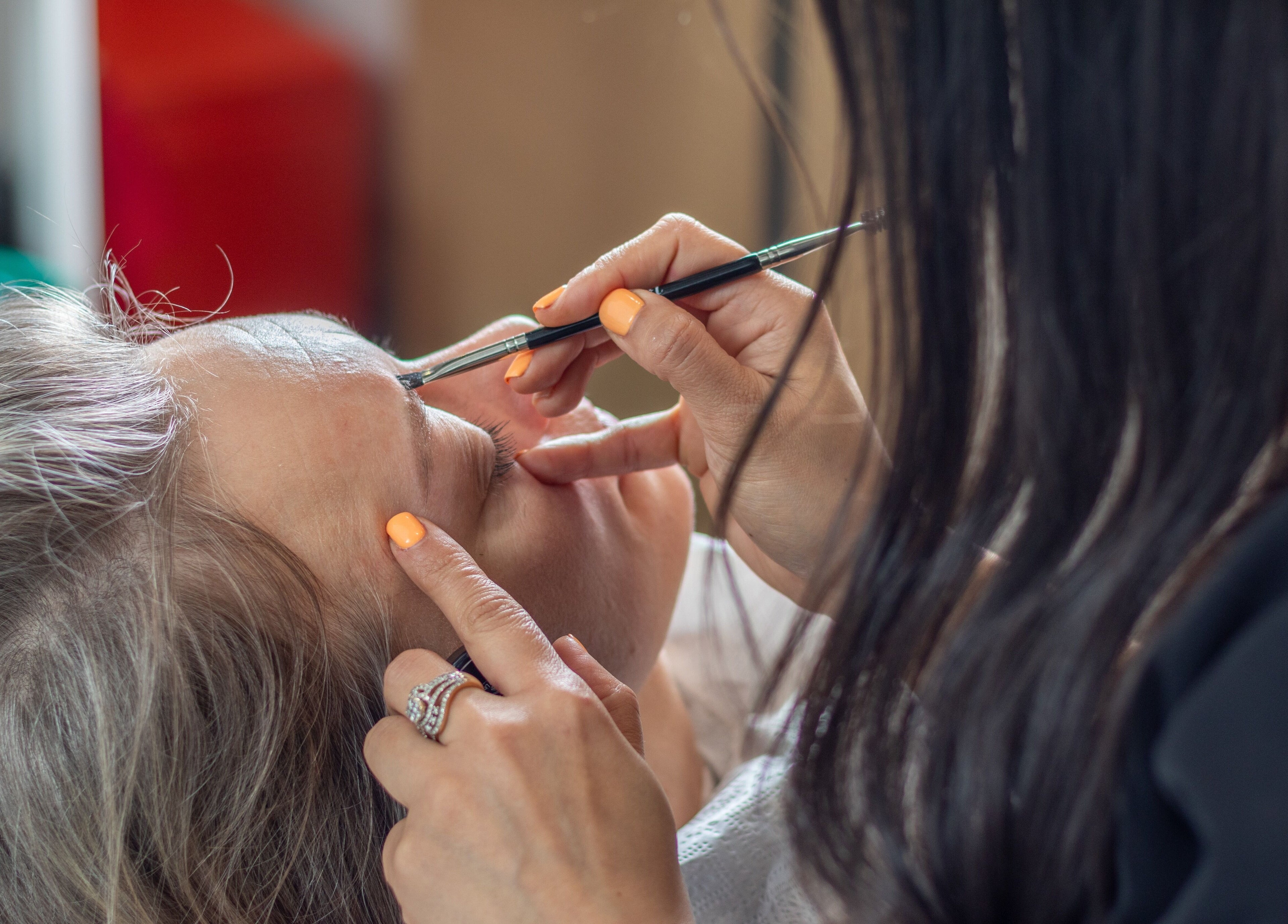 Expert shaping brows at Blink Brow Bar Bute St, Vancouver, British Columbia, CA.