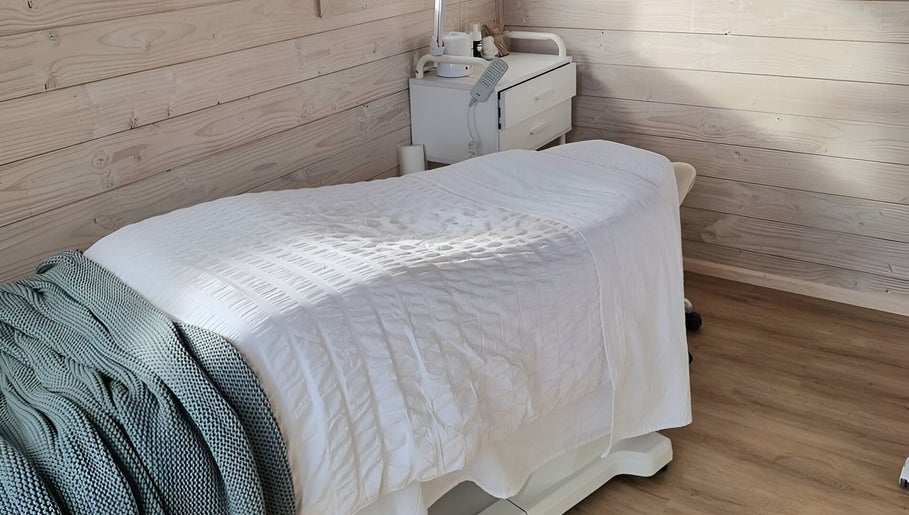Serene treatment room at Sarah Black, Culverden, Canterbury, NZ with cozy massage table.
