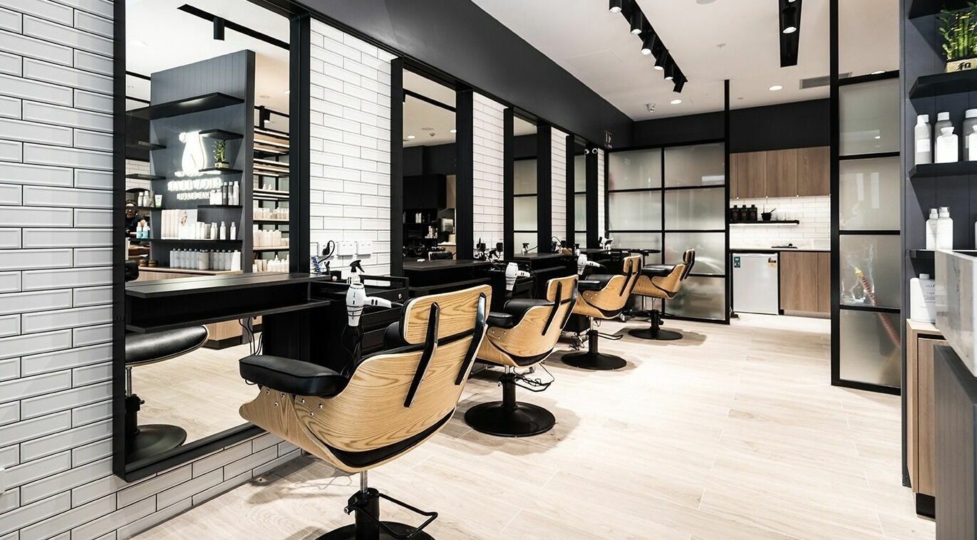 Modern interior of Lane Cove Market Square Snowbear Hairdressing in Lane Cove, New South Wales, AU with stylish chairs.