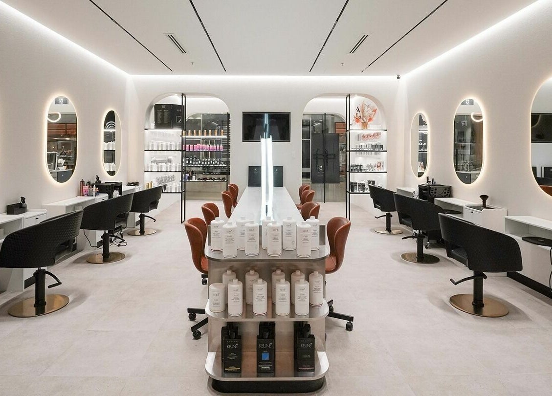 Chic salon interior at Macquarie Shopping Centre Snowbear Hairdressing, Macquarie Park, New South Wales, AU.