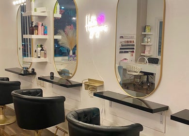 Luxurious salon chairs and mirrors at Dumbarton beauty venue in Dumbarton, Scotland, GB.
