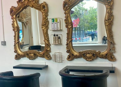 Luxurious salon mirrors at Dumbarton, Scotland, GB enhancing beauty experience with stylish decor.