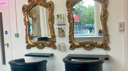 Luxurious salon mirrors at Dumbarton, Scotland, GB enhancing beauty experience with stylish decor.