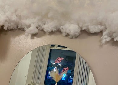Elegant cloud-themed mirror decor at Dumbarton wellness venue, Dumbarton, Scotland, GB.